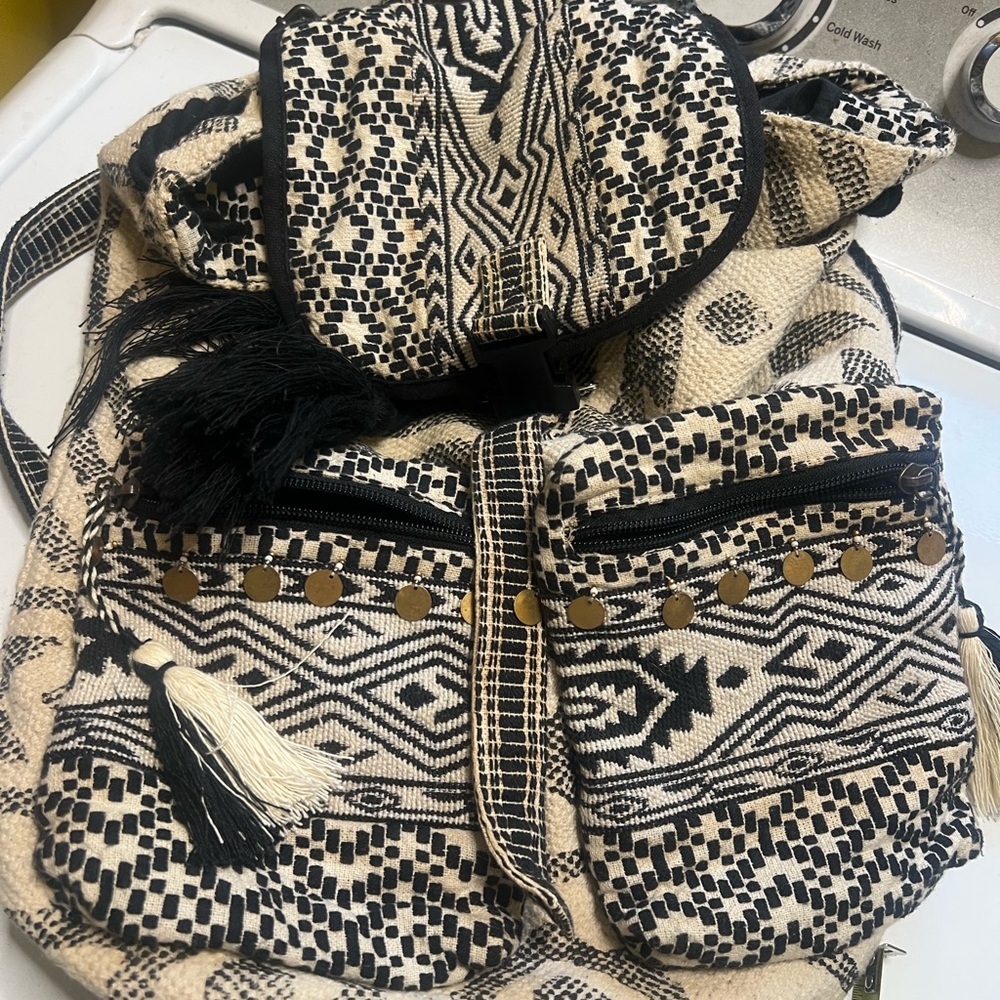 Boho Black and Cream Woven Backpack with Tassel Detail